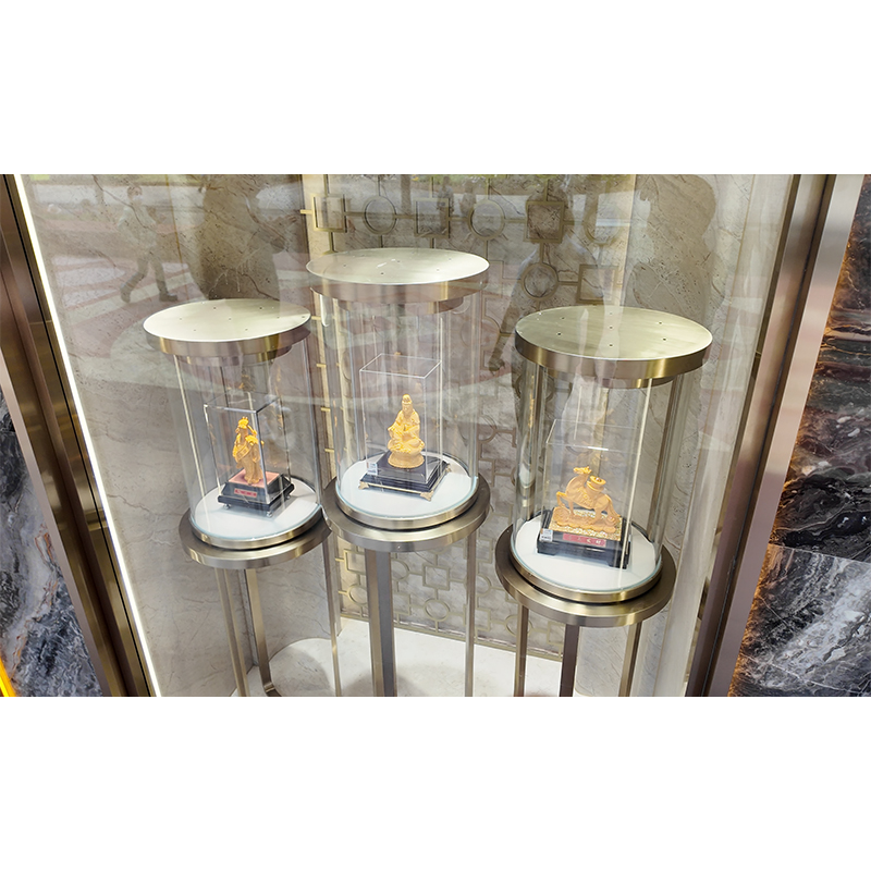 How to ensure color uniformity when using champagne gold electroplating on a high-end window jewelry display cabinet?